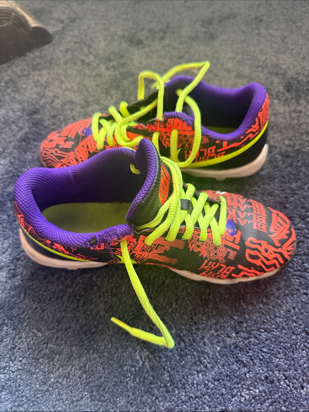 Nike OBJ boys cleats. Neon Lime and Orange & Purple Graphic cleats